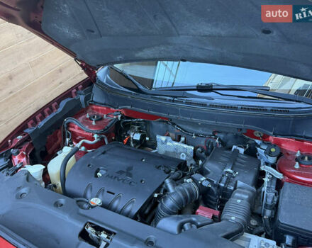 Красный Мицубиси Outlander Sport, объемом двигателя 2 л и пробегом 99 тыс. км за 11999 $, фото 48 на Automoto.ua