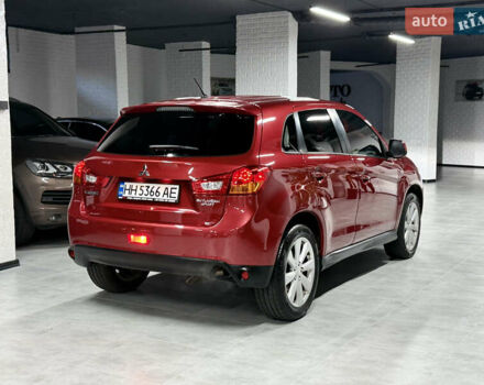Красный Мицубиси Outlander Sport, объемом двигателя 2 л и пробегом 99 тыс. км за 11999 $, фото 22 на Automoto.ua