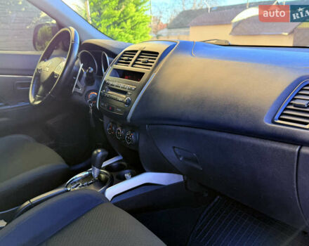 Красный Мицубиси Outlander Sport, объемом двигателя 2 л и пробегом 99 тыс. км за 11999 $, фото 25 на Automoto.ua