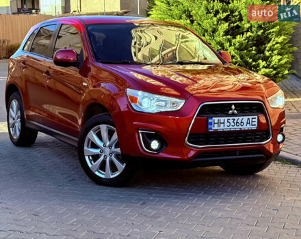 Красный Мицубиси Outlander Sport, объемом двигателя 2 л и пробегом 99 тыс. км за 11999 $, фото 4 на Automoto.ua