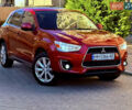 Красный Мицубиси Outlander Sport, объемом двигателя 2 л и пробегом 99 тыс. км за 11999 $, фото 4 на Automoto.ua