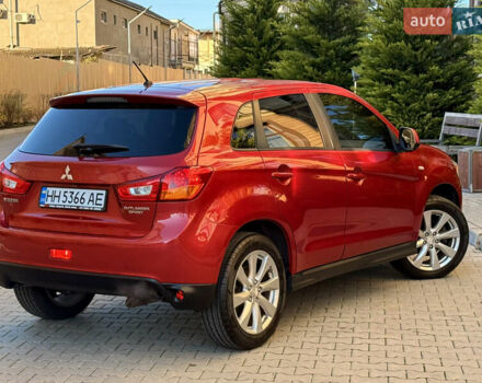 Красный Мицубиси Outlander Sport, объемом двигателя 2 л и пробегом 99 тыс. км за 11999 $, фото 58 на Automoto.ua