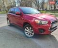 Красный Мицубиси Outlander Sport, объемом двигателя 2 л и пробегом 220 тыс. км за 11500 $, фото 7 на Automoto.ua