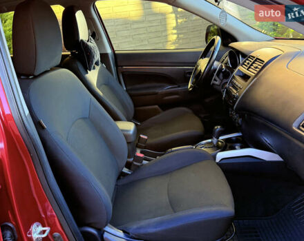 Красный Мицубиси Outlander Sport, объемом двигателя 2 л и пробегом 99 тыс. км за 11999 $, фото 24 на Automoto.ua