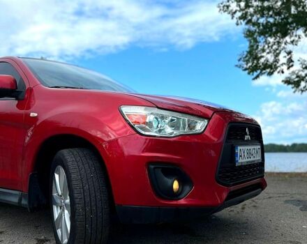 Красный Мицубиси Outlander Sport, объемом двигателя 2 л и пробегом 174 тыс. км за 10700 $, фото 4 на Automoto.ua