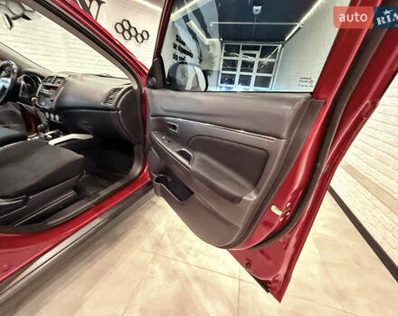 Красный Мицубиси Outlander Sport, объемом двигателя 2 л и пробегом 99 тыс. км за 11999 $, фото 38 на Automoto.ua