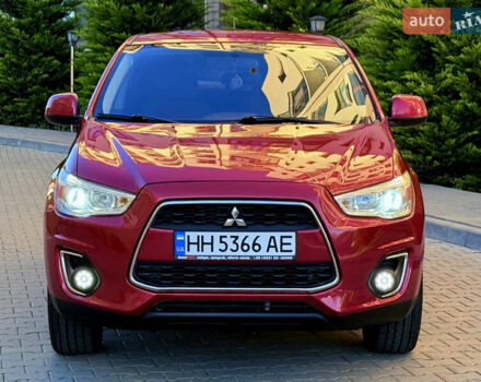 Красный Мицубиси Outlander Sport, объемом двигателя 2 л и пробегом 99 тыс. км за 11999 $, фото 6 на Automoto.ua