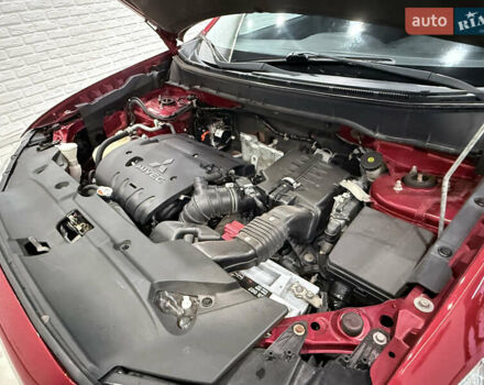 Красный Мицубиси Outlander Sport, объемом двигателя 2 л и пробегом 99 тыс. км за 11999 $, фото 24 на Automoto.ua