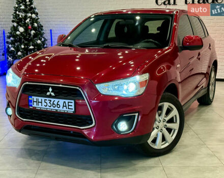 Красный Мицубиси Outlander Sport, объемом двигателя 2 л и пробегом 99 тыс. км за 11999 $, фото 2 на Automoto.ua