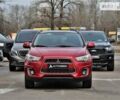 Красный Мицубиси Outlander Sport, объемом двигателя 2 л и пробегом 195 тыс. км за 12800 $, фото 1 на Automoto.ua