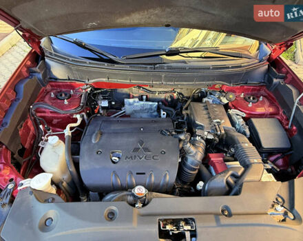 Красный Мицубиси Outlander Sport, объемом двигателя 2 л и пробегом 99 тыс. км за 11999 $, фото 7 на Automoto.ua