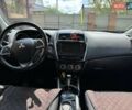 Красный Мицубиси Outlander Sport, объемом двигателя 2 л и пробегом 172 тыс. км за 12500 $, фото 6 на Automoto.ua