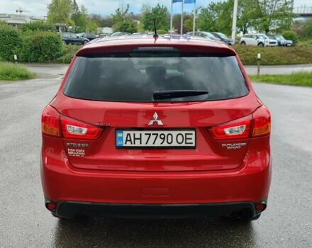 Красный Мицубиси Outlander Sport, объемом двигателя 2 л и пробегом 170 тыс. км за 10500 $, фото 3 на Automoto.ua