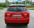 Червоний Міцубісі Outlander Sport, об'ємом двигуна 2 л та пробігом 170 тис. км за 10500 $, фото 3 на Automoto.ua