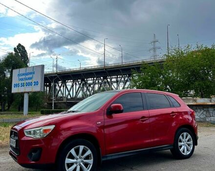 Красный Мицубиси Outlander Sport, объемом двигателя 2 л и пробегом 174 тыс. км за 10700 $, фото 3 на Automoto.ua