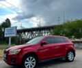 Красный Мицубиси Outlander Sport, объемом двигателя 2 л и пробегом 174 тыс. км за 10700 $, фото 3 на Automoto.ua