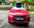 Красный Мицубиси Outlander Sport, объемом двигателя 2 л и пробегом 220 тыс. км за 11300 $, фото 3 на Automoto.ua