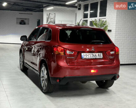 Красный Мицубиси Outlander Sport, объемом двигателя 2 л и пробегом 99 тыс. км за 11999 $, фото 20 на Automoto.ua