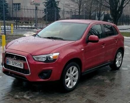 Красный Мицубиси Outlander Sport, объемом двигателя 2 л и пробегом 220 тыс. км за 11500 $, фото 1 на Automoto.ua