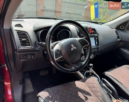 Красный Мицубиси Outlander Sport, объемом двигателя 2 л и пробегом 172 тыс. км за 12500 $, фото 5 на Automoto.ua
