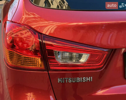 Красный Мицубиси Outlander Sport, объемом двигателя 2 л и пробегом 99 тыс. км за 11999 $, фото 27 на Automoto.ua