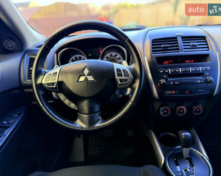 Красный Мицубиси Outlander Sport, объемом двигателя 2 л и пробегом 99 тыс. км за 11999 $, фото 35 на Automoto.ua