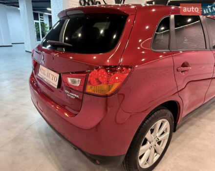 Красный Мицубиси Outlander Sport, объемом двигателя 2 л и пробегом 99 тыс. км за 11999 $, фото 54 на Automoto.ua