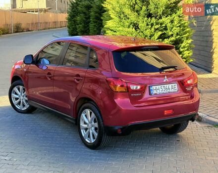 Красный Мицубиси Outlander Sport, объемом двигателя 2 л и пробегом 99 тыс. км за 11999 $, фото 54 на Automoto.ua