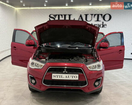 Красный Мицубиси Outlander Sport, объемом двигателя 2 л и пробегом 99 тыс. км за 11999 $, фото 27 на Automoto.ua