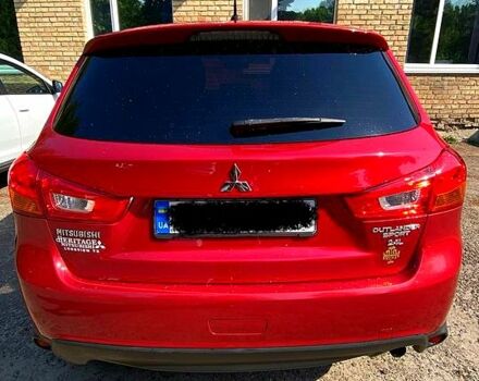 Красный Мицубиси Outlander Sport, объемом двигателя 2.4 л и пробегом 214 тыс. км за 11000 $, фото 4 на Automoto.ua