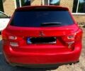 Красный Мицубиси Outlander Sport, объемом двигателя 2.4 л и пробегом 214 тыс. км за 11000 $, фото 4 на Automoto.ua