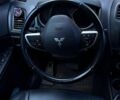 Красный Мицубиси Outlander Sport, объемом двигателя 2.4 л и пробегом 214 тыс. км за 11000 $, фото 3 на Automoto.ua
