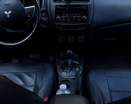 Красный Мицубиси Outlander Sport, объемом двигателя 2.4 л и пробегом 214 тыс. км за 11000 $, фото 1 на Automoto.ua