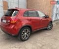 Красный Мицубиси Outlander Sport, объемом двигателя 2 л и пробегом 140 тыс. км за 12300 $, фото 4 на Automoto.ua