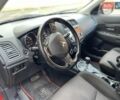 Красный Мицубиси Outlander Sport, объемом двигателя 2 л и пробегом 140 тыс. км за 12300 $, фото 7 на Automoto.ua