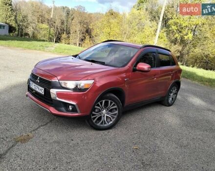 Красный Мицубиси Outlander Sport, объемом двигателя 2.4 л и пробегом 185 тыс. км за 12299 $, фото 2 на Automoto.ua