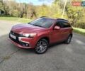 Красный Мицубиси Outlander Sport, объемом двигателя 2.4 л и пробегом 185 тыс. км за 12299 $, фото 2 на Automoto.ua