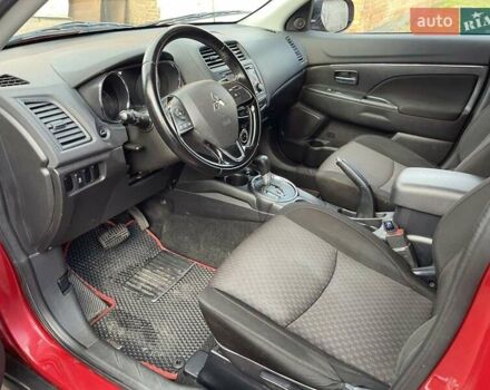 Красный Мицубиси Outlander Sport, объемом двигателя 2 л и пробегом 140 тыс. км за 12300 $, фото 8 на Automoto.ua