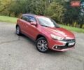 Красный Мицубиси Outlander Sport, объемом двигателя 2.4 л и пробегом 185 тыс. км за 12299 $, фото 8 на Automoto.ua