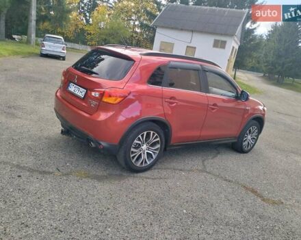 Красный Мицубиси Outlander Sport, объемом двигателя 2.4 л и пробегом 185 тыс. км за 12299 $, фото 12 на Automoto.ua