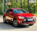 Красный Мицубиси Outlander Sport, объемом двигателя 2.4 л и пробегом 156 тыс. км за 11999 $, фото 1 на Automoto.ua