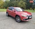 Красный Мицубиси Outlander Sport, объемом двигателя 2.4 л и пробегом 185 тыс. км за 12299 $, фото 7 на Automoto.ua