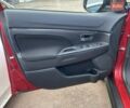 Красный Мицубиси Outlander Sport, объемом двигателя 2 л и пробегом 140 тыс. км за 12300 $, фото 6 на Automoto.ua