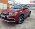 Красный Мицубиси Outlander Sport, объемом двигателя 2 л и пробегом 140 тыс. км за 12300 $, фото 1 на Automoto.ua