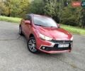 Красный Мицубиси Outlander Sport, объемом двигателя 2.4 л и пробегом 185 тыс. км за 12299 $, фото 4 на Automoto.ua