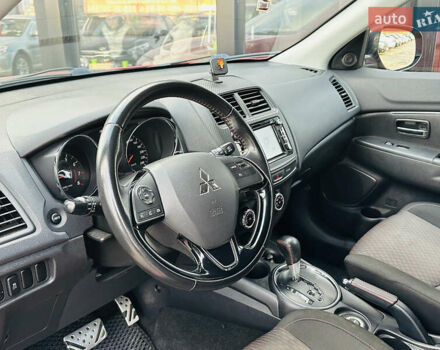 Красный Мицубиси Outlander Sport, объемом двигателя 2 л и пробегом 127 тыс. км за 12499 $, фото 19 на Automoto.ua