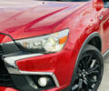 Красный Мицубиси Outlander Sport, объемом двигателя 2 л и пробегом 127 тыс. км за 12499 $, фото 2 на Automoto.ua