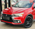 Красный Мицубиси Outlander Sport, объемом двигателя 2 л и пробегом 127 тыс. км за 12499 $, фото 1 на Automoto.ua