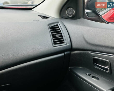 Красный Мицубиси Outlander Sport, объемом двигателя 2 л и пробегом 127 тыс. км за 12499 $, фото 31 на Automoto.ua