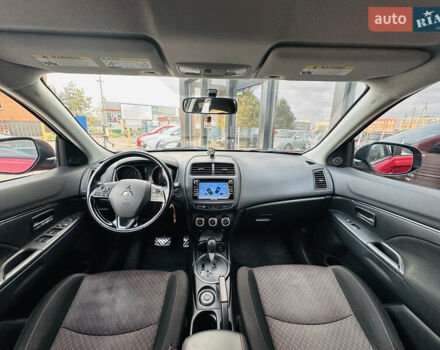 Красный Мицубиси Outlander Sport, объемом двигателя 2 л и пробегом 127 тыс. км за 12499 $, фото 26 на Automoto.ua